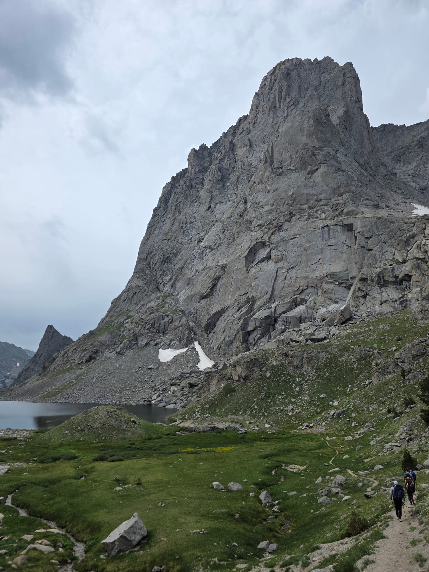 A granite spire above an alpine meadow in the Cirque of the Towers